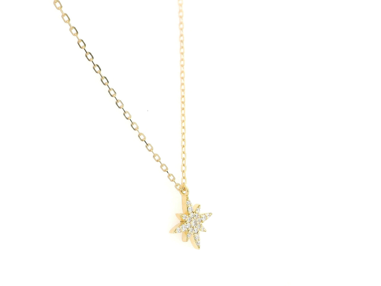 Diamond north star pendant necklace in 18K yellow gold by Emirates Diamonds