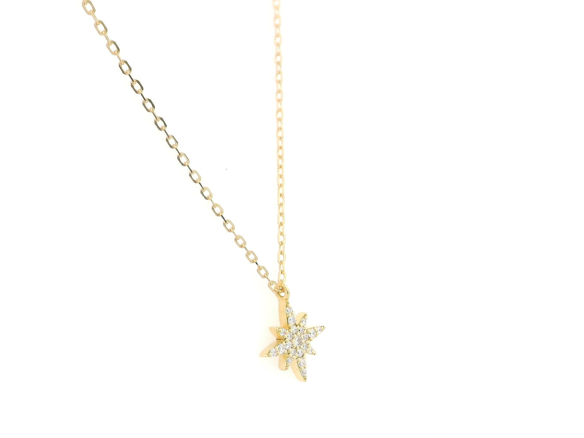 Diamond north star pendant necklace in 18K yellow gold by Emirates Diamonds
