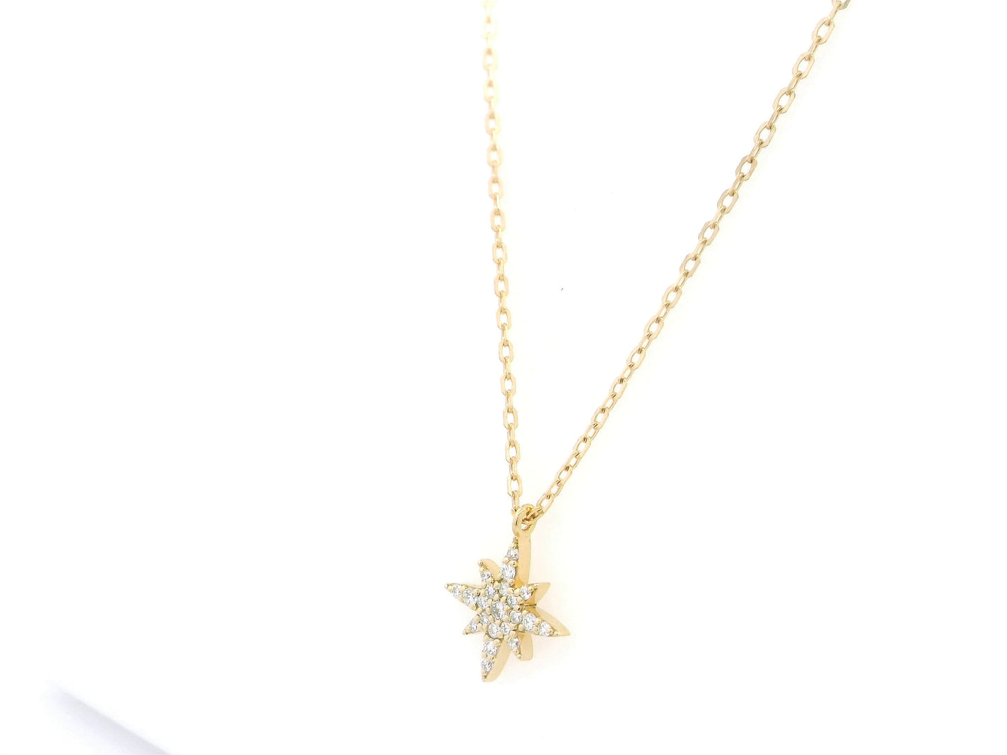 Diamond north star pendant necklace in 18K yellow gold by Emirates Diamonds