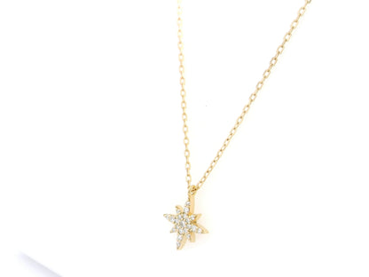 Diamond north star pendant necklace in 18K yellow gold by Emirates Diamonds