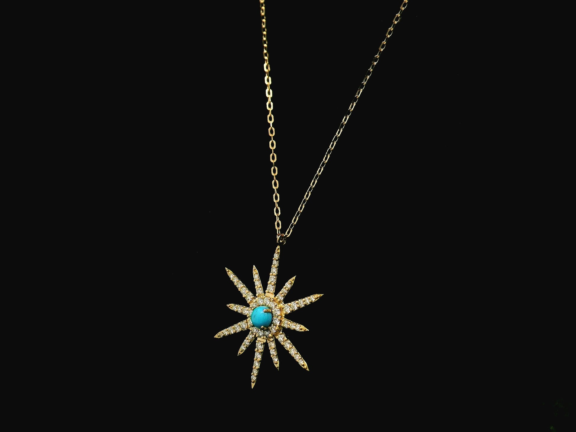 Turquoise and diamond starburst pendant in 18K yellow gold by Emirates Diamonds