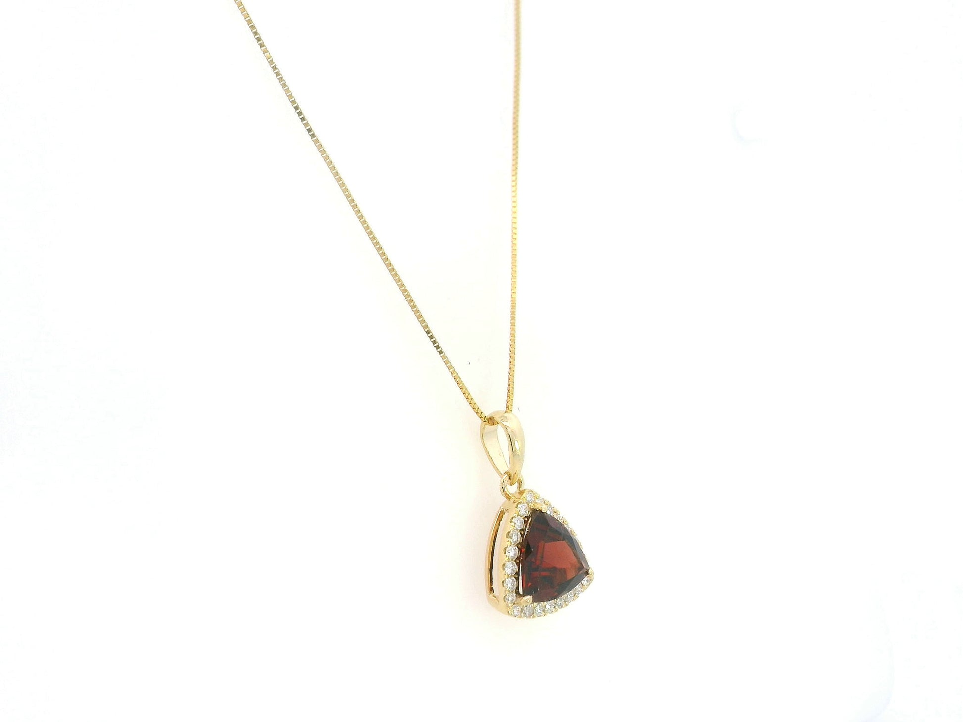 Trillion Cut Garnet and Diamond Halo Pendant in 18K Yellow Gold by Emirates Diamonds