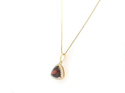 Trillion Cut Garnet and Diamond Halo Pendant in 18K Yellow Gold by Emirates Diamonds