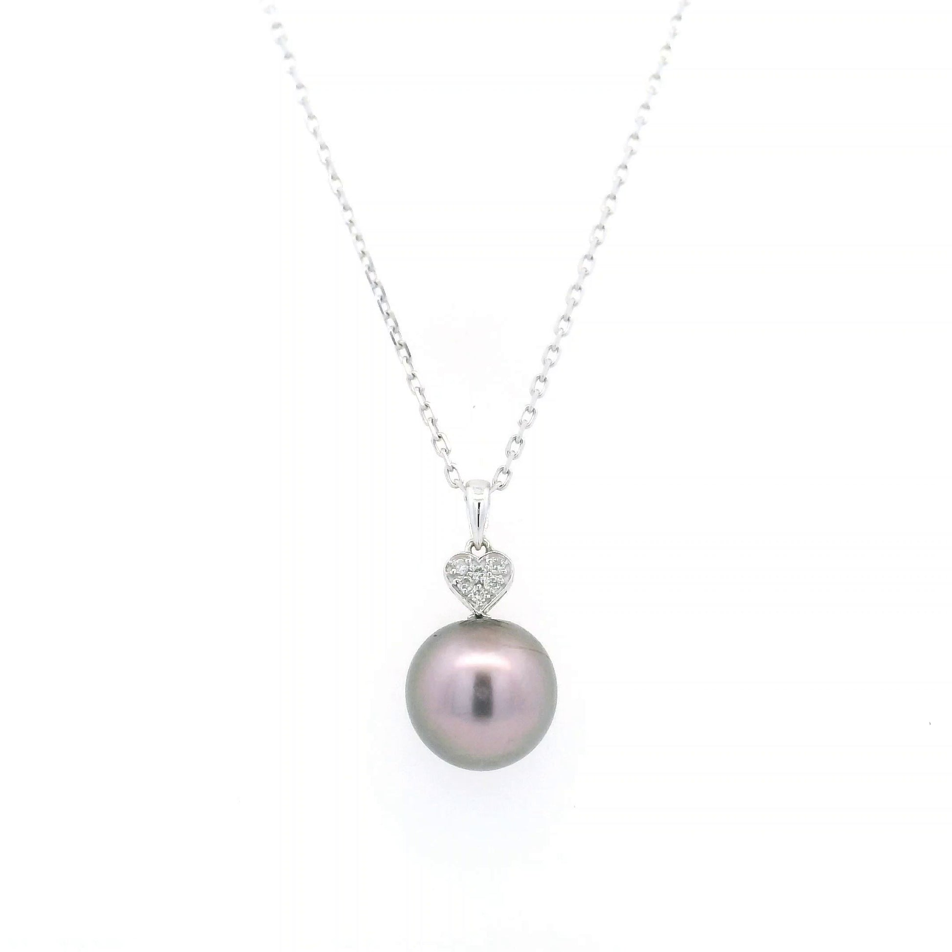 Tahitian black pearl diamond heart pendant in 18K white gold with natural diamond accent.