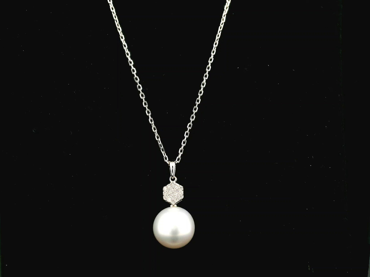 South Sea pearl pendant in 18K white gold with natural diamond geometric accent.