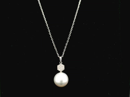 South Sea pearl pendant in 18K white gold with natural diamond geometric accent.
