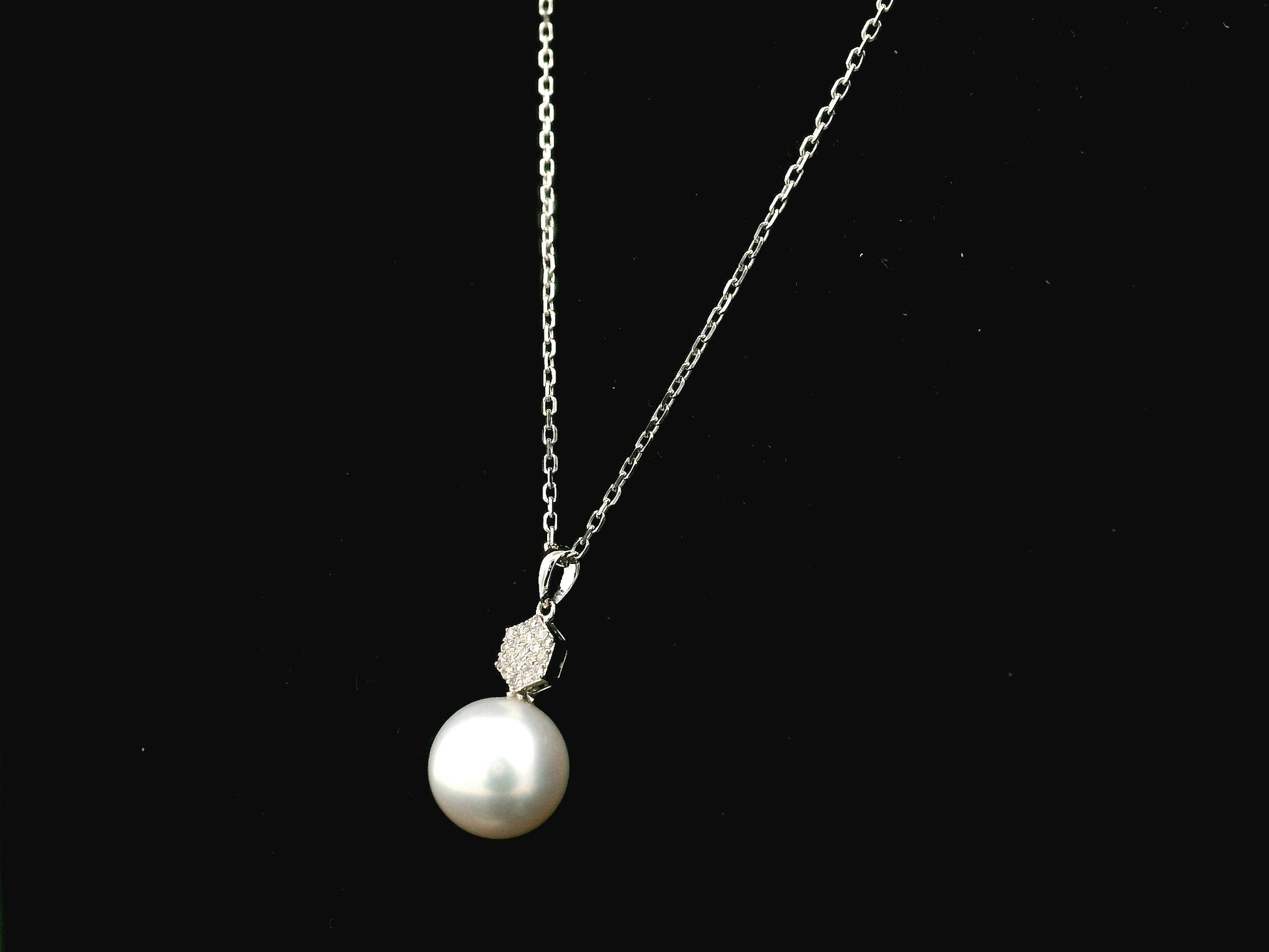 South Sea pearl pendant in 18K white gold with natural diamond geometric accent.