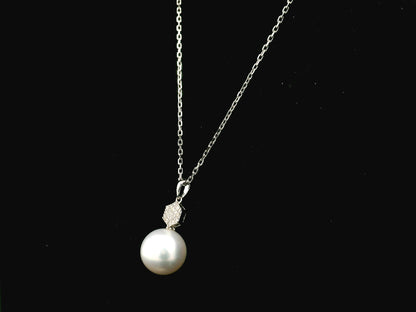 South Sea pearl pendant in 18K white gold with natural diamond geometric accent.