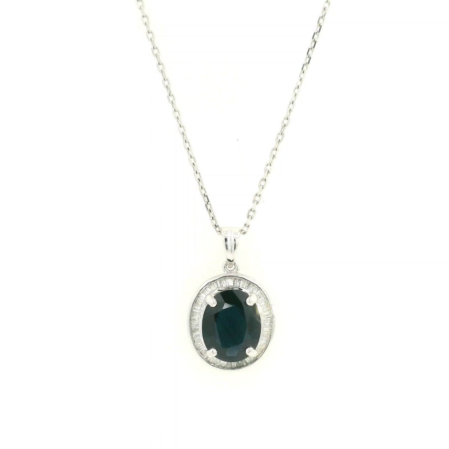 18K white gold oval blue sapphire pendant featuring a 2.71 carat natural blue sapphire surrounded by a baguette diamond halo with 0.32 carat natural diamonds. Pendant only, chain not included.