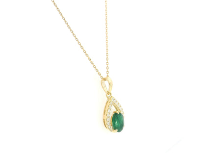18K yellow gold emerald pendant featuring a 0.91 carat natural emerald surrounded by a teardrop diamond design with 0.13 carat natural diamonds.