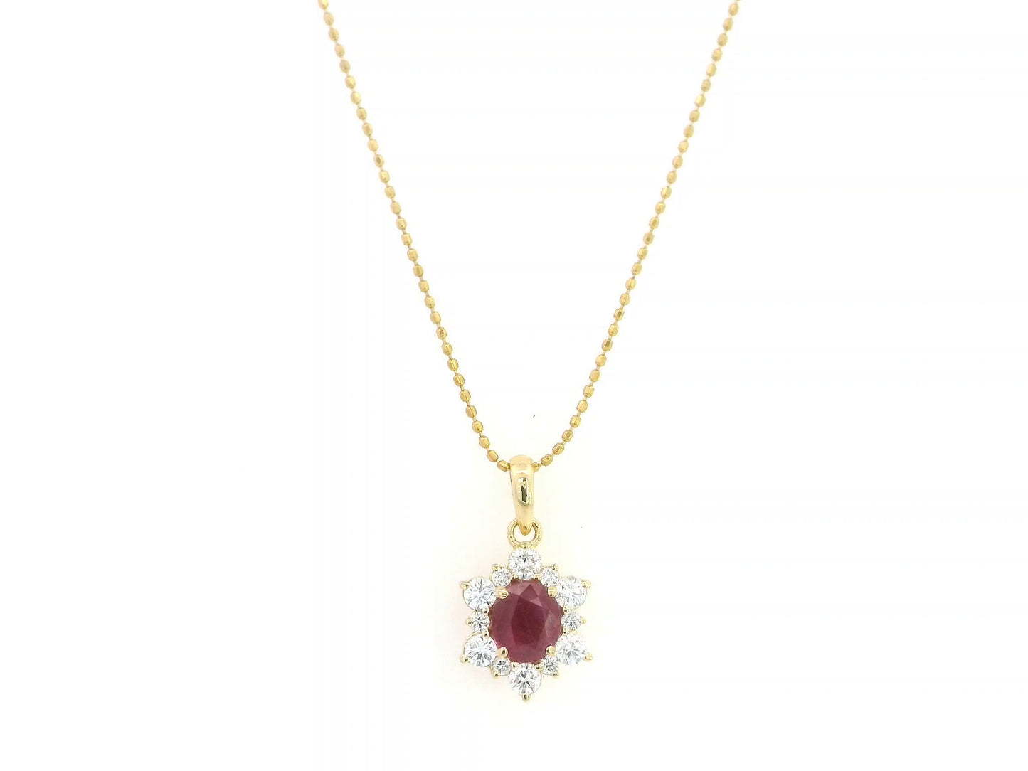 18K yellow gold oval ruby halo pendant featuring a 1.09 carat natural ruby surrounded by 0.48 carat natural diamonds in a floral-inspired halo design, supplied without a chain.
