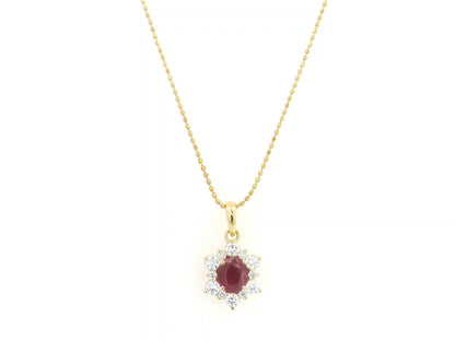 18K yellow gold oval ruby halo pendant featuring a 1.09 carat natural ruby surrounded by 0.48 carat natural diamonds in a floral-inspired halo design, supplied without a chain.