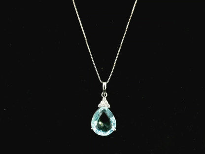 18K white gold pendant featuring a 10.82 carat natural pear-shaped aquamarine accented with 0.13 carat natural round brilliant diamonds. Chain not included.