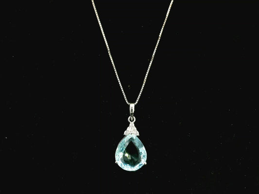 18K white gold pendant featuring a 10.82 carat natural pear-shaped aquamarine accented with 0.13 carat natural round brilliant diamonds. Chain not included.