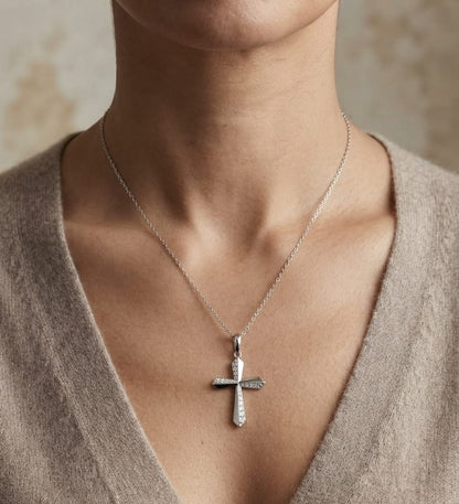 18K white gold diamond cross pendant featuring 0.23 carat natural round brilliant diamonds in a modern geometric cross design.