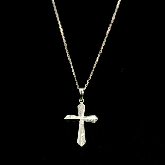 18K white gold diamond cross pendant featuring 0.23 carat natural round brilliant diamonds in a modern geometric cross design.