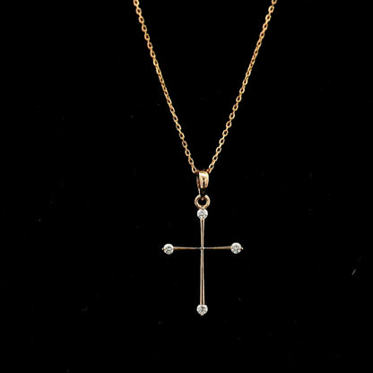 18K rose gold minimalist natural diamond cross pendant with four round brilliant diamonds.
