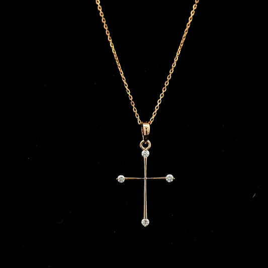 18K rose gold minimalist natural diamond cross pendant with four round brilliant diamonds.