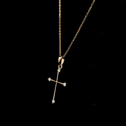 18K rose gold minimalist natural diamond cross pendant with four round brilliant diamonds.