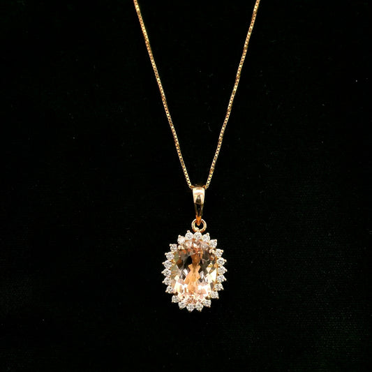 18K rose gold oval Morganite halo pendant featuring a 2.85 carat natural Morganite surrounded by natural diamonds.