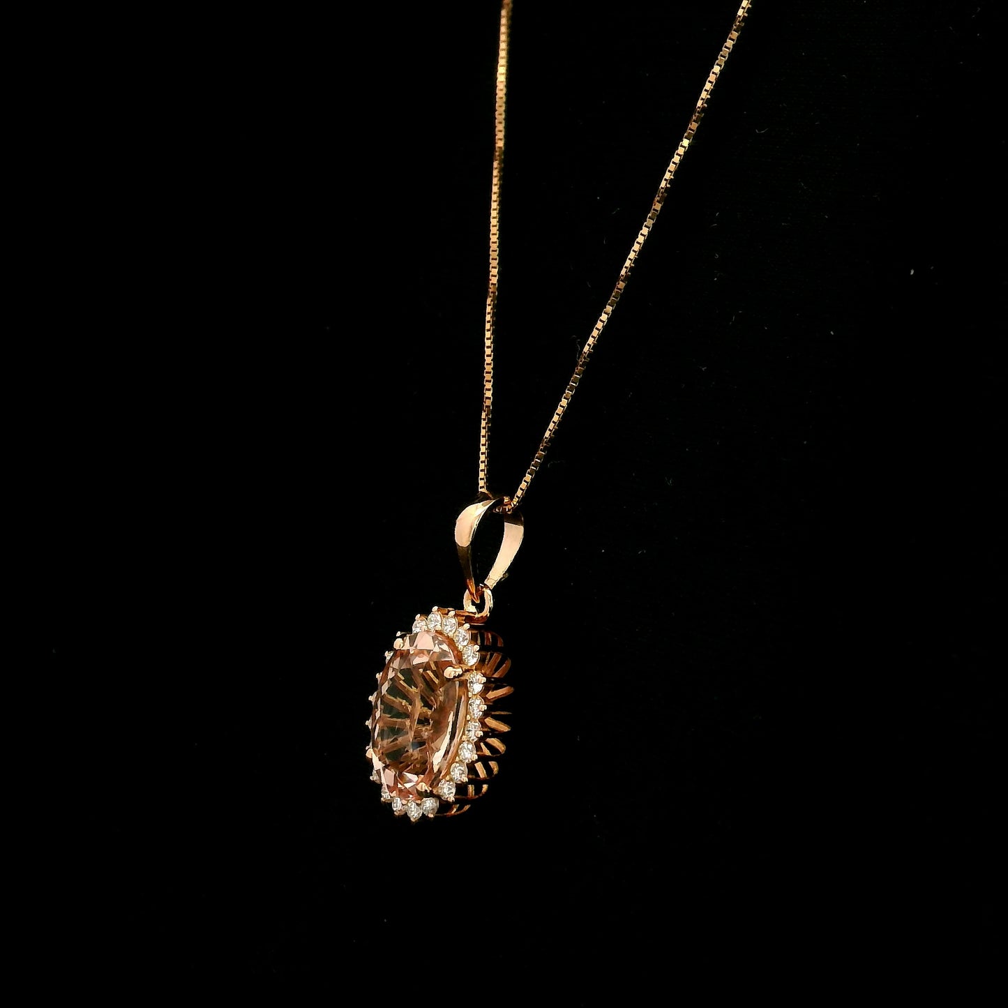 18K rose gold oval Morganite halo pendant featuring a 2.85 carat natural Morganite surrounded by natural diamonds.