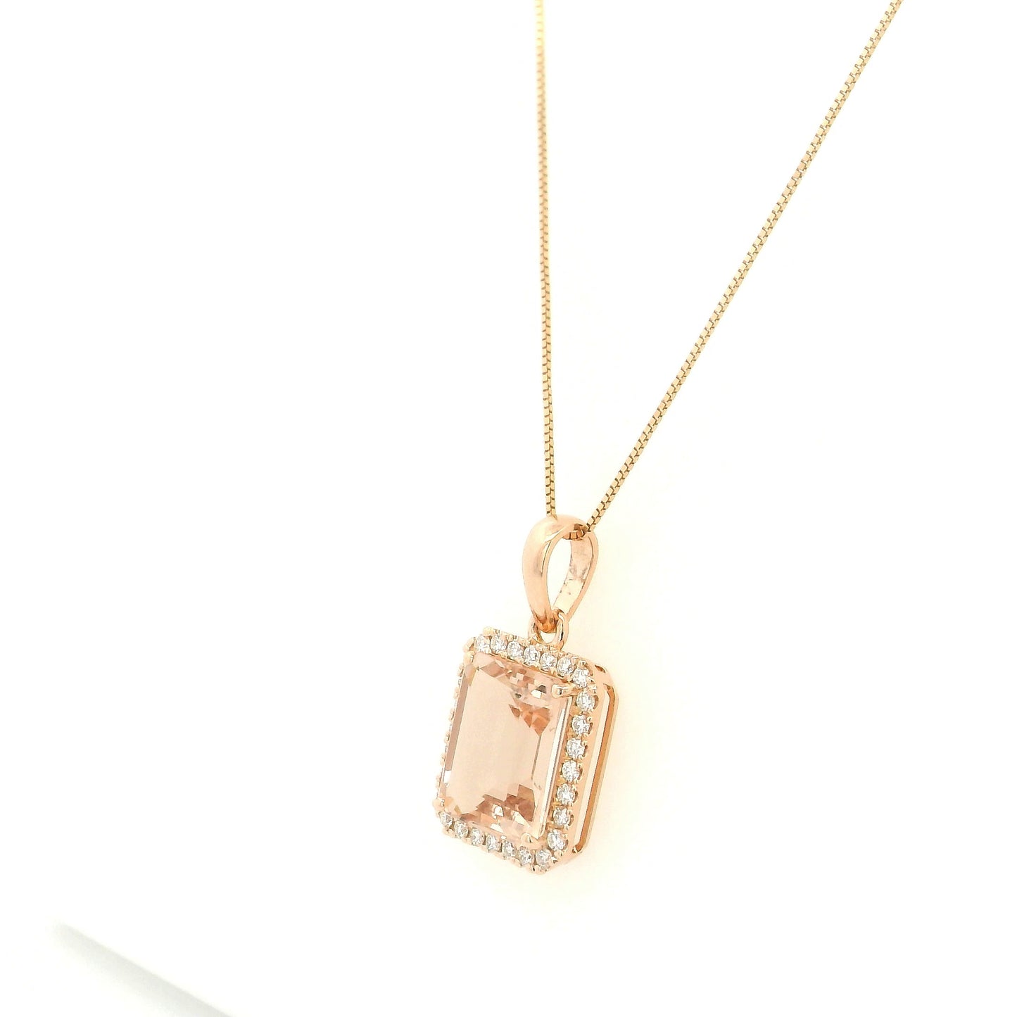 18K rose gold emerald cut Morganite halo pendant featuring a 3.58 carat natural Morganite surrounded by natural diamonds.