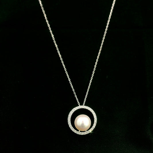 Fresh Water Pearl and diamond pendant necklace with round pearl, open diamond circle and 18K white gold chain.