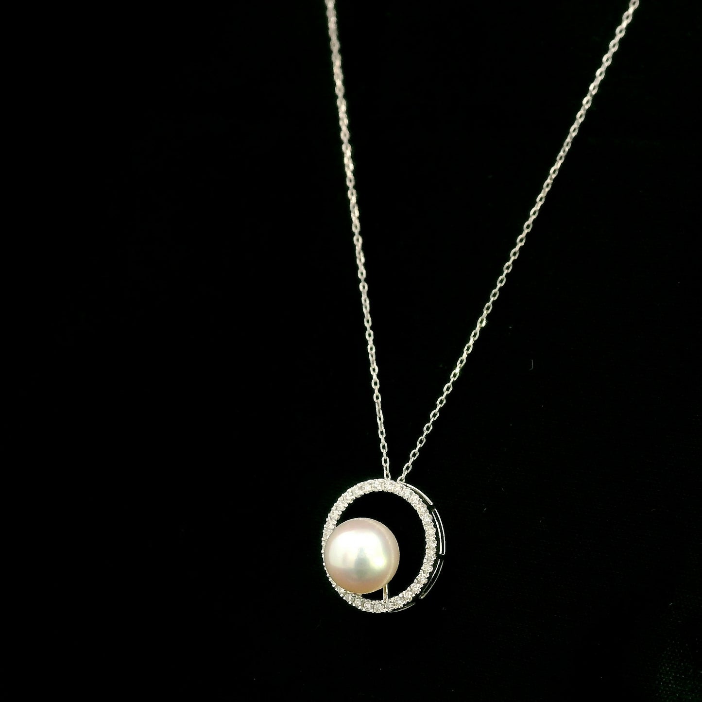 Fresh Water Pearl and diamond pendant necklace with round pearl, open diamond circle and 18K white gold chain.