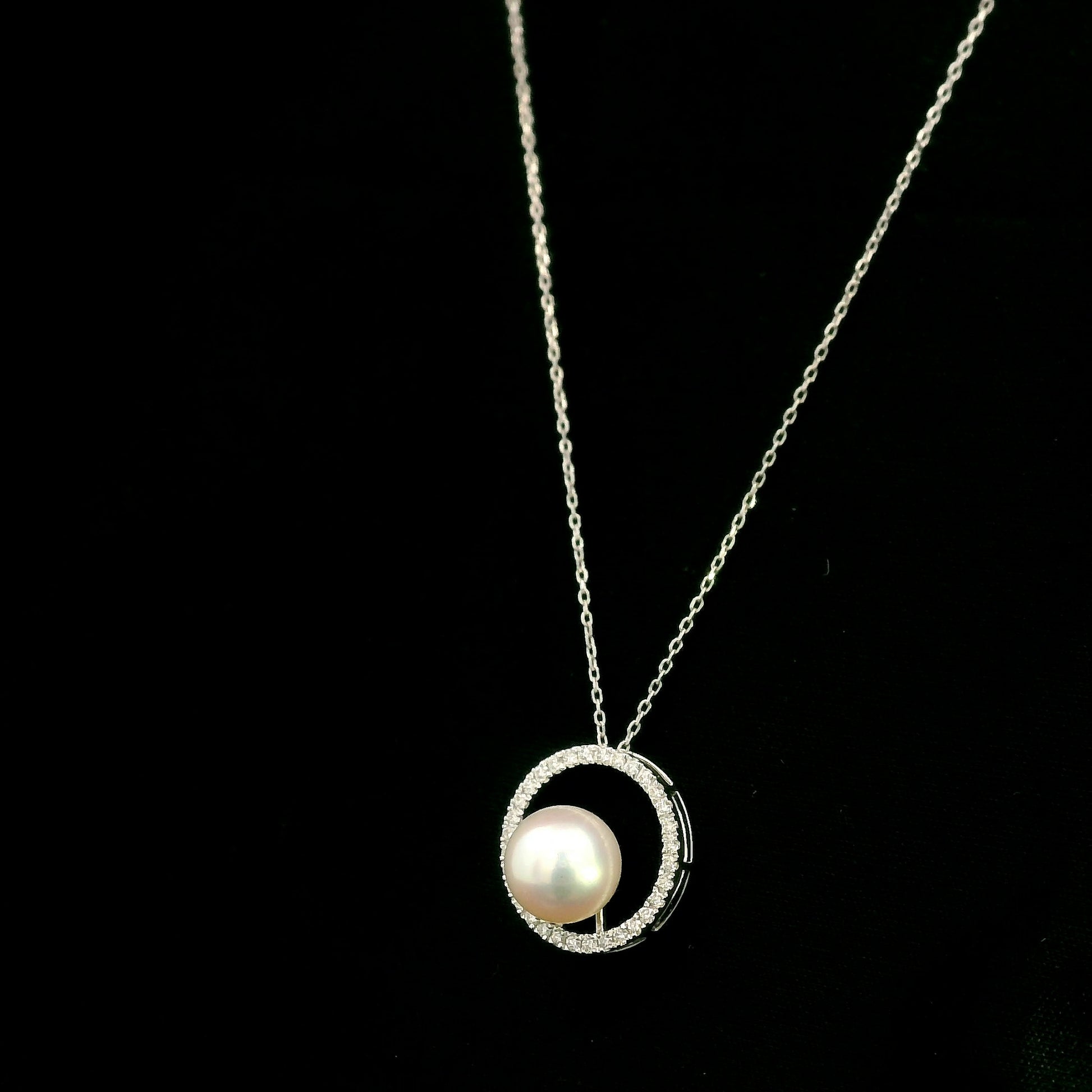 Fresh Water Pearl and diamond pendant necklace with round pearl, open diamond circle and 18K white gold chain.