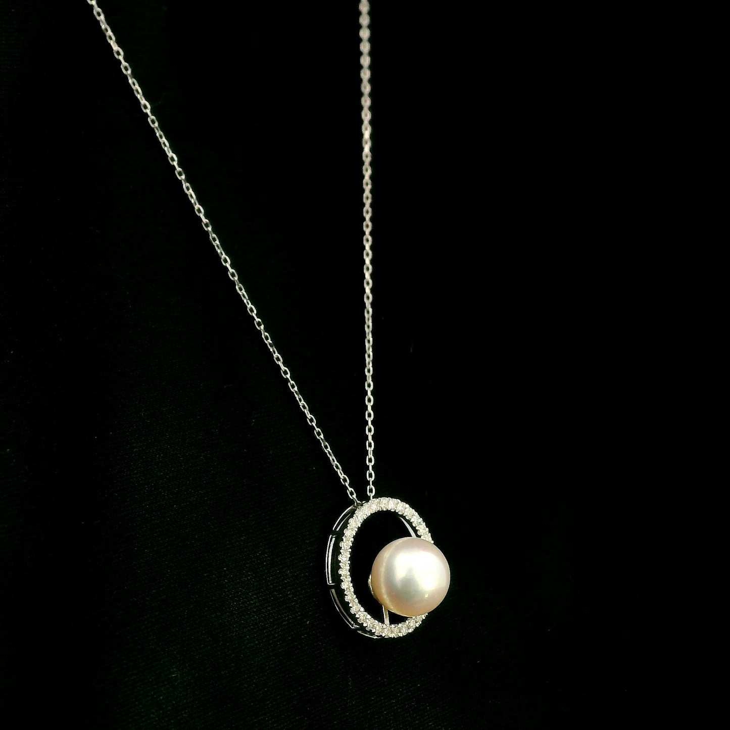 Fresh water Pearl and diamond pendant necklace with round pearl, open diamond circle and 18K white gold chain.