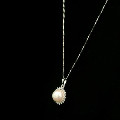18K white gold pearl pendant with round diamond halo and 0.16 carat natural diamonds