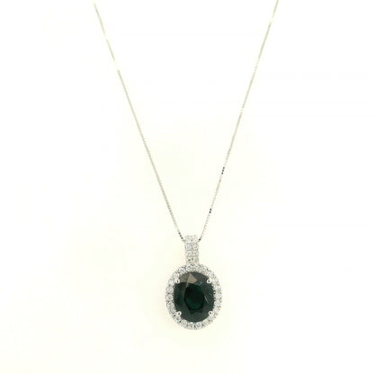 Oval sapphire and diamond halo pendant in 18K white gold with diamond-set bail