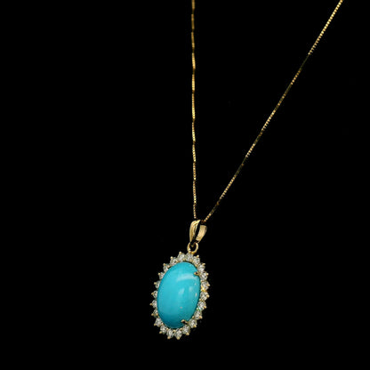 Oval turquoise and diamond halo pendant in 18K yellow gold with 3.81 carat turquoise and round diamonds