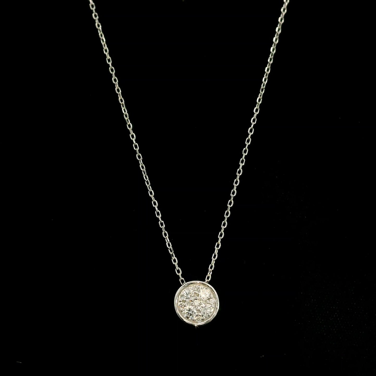 18K yellow gold diamond cross pendant set with 3.22 carats of princess cut diamonds and a diamond-set bail.