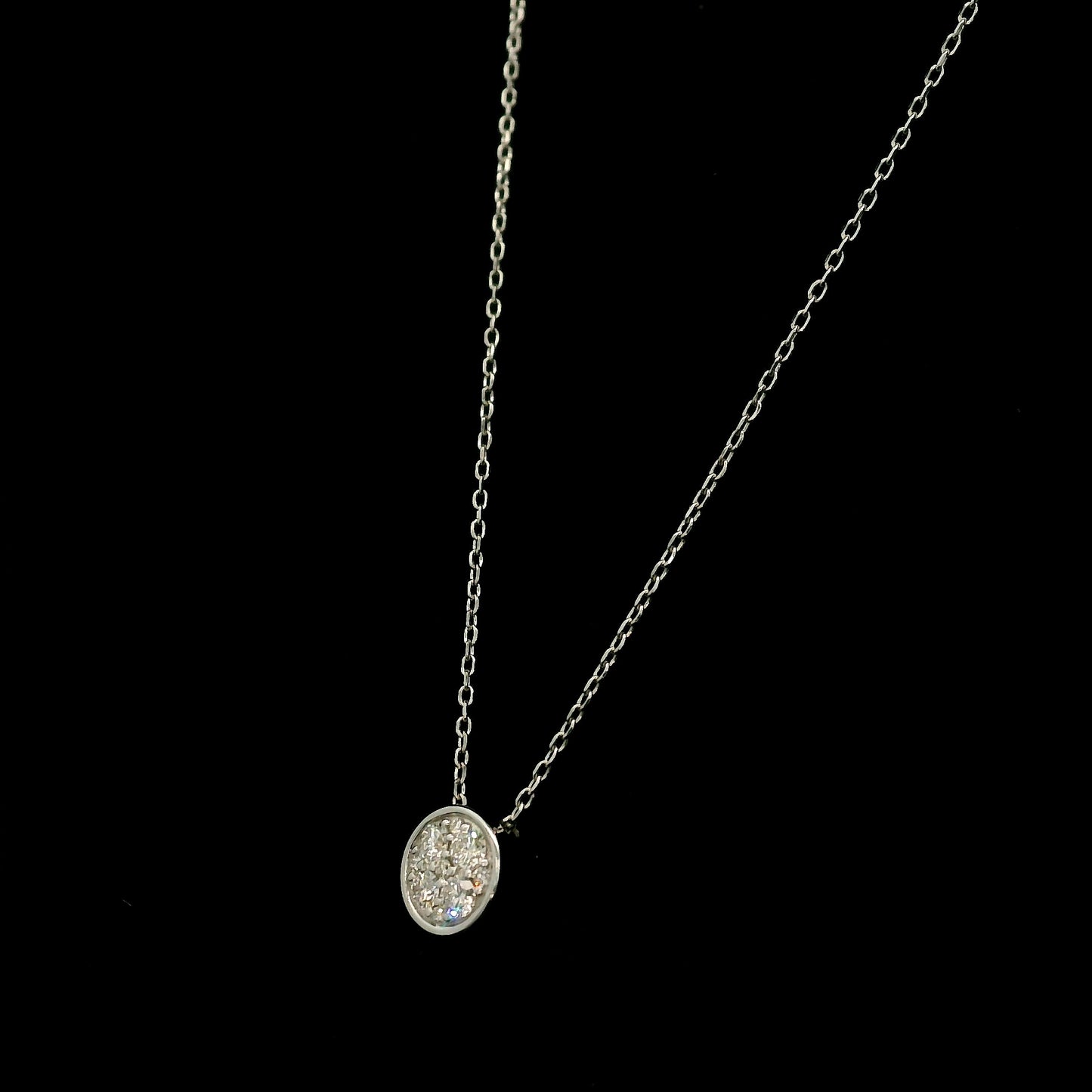 18K yellow gold diamond cross pendant set with 3.22 carats of princess cut diamonds and a diamond-set bail.