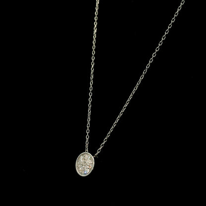 18K yellow gold diamond cross pendant set with 3.22 carats of princess cut diamonds and a diamond-set bail.