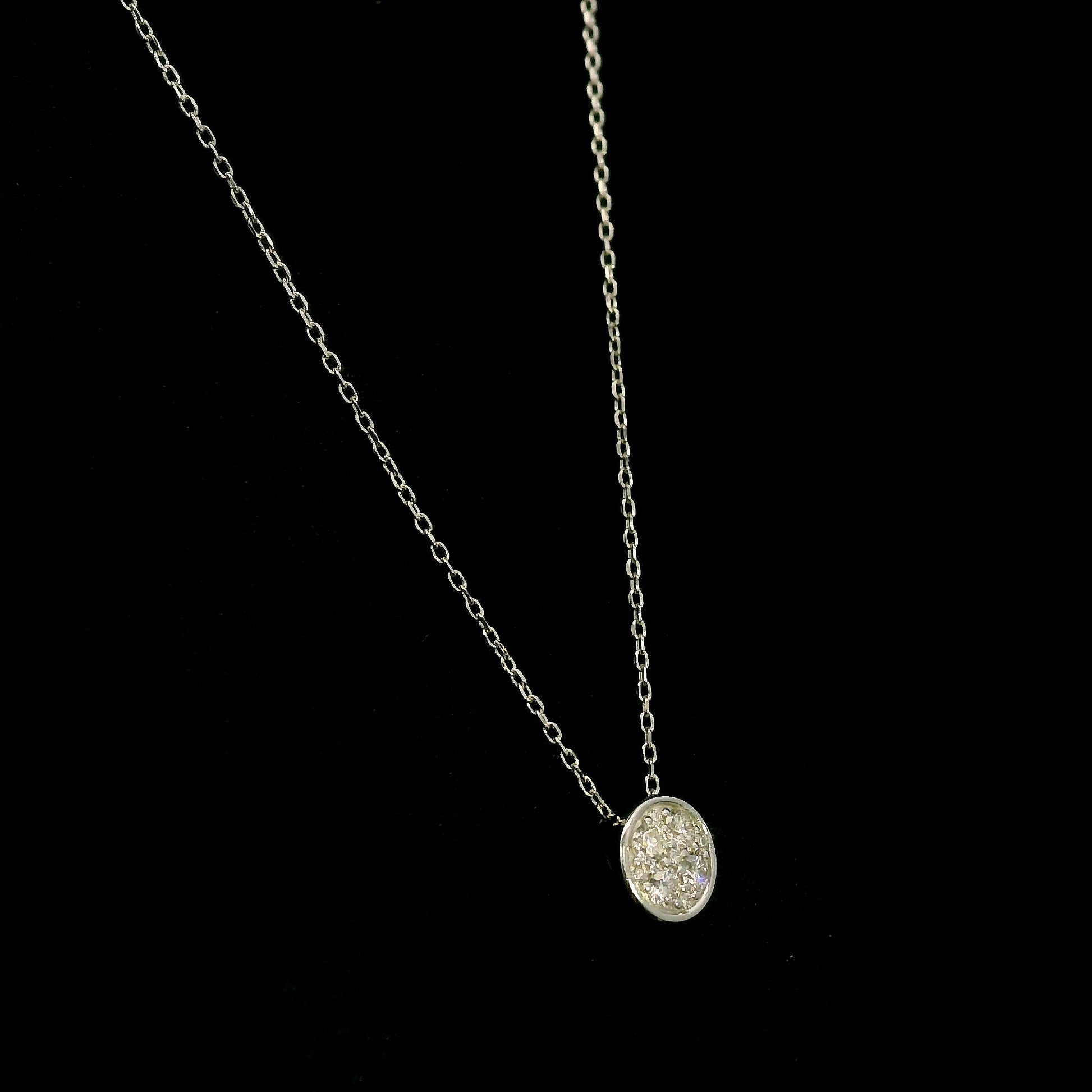 18K yellow gold diamond cross pendant set with 3.22 carats of princess cut diamonds and a diamond-set bail.