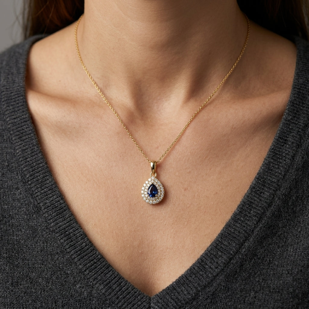 Pear Shaped Sapphire and Diamond Pendant in 18K Yellow Gold