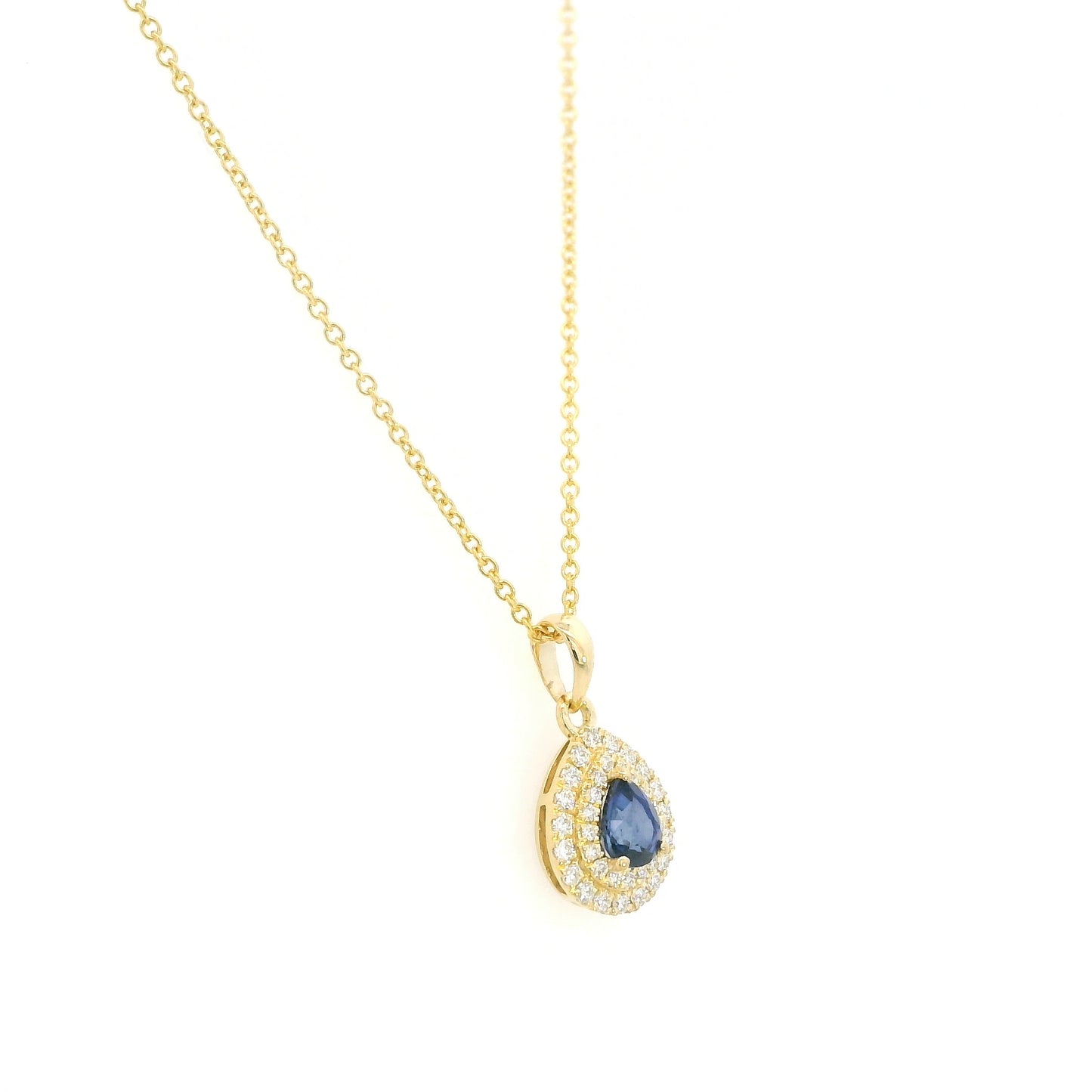 Pear shaped blue sapphire and double diamond halo pendant in 18K yellow gold