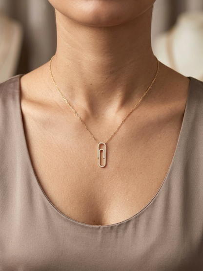 Diamond paperclip pendant necklace in 18K yellow gold with 0.23 carat diamonds by Emirates Diamonds.