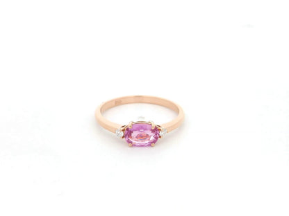 Oval pink sapphire ring with diamond accents in 18K rose gold by Emirates Diamonds