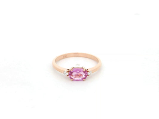 Oval pink sapphire ring with diamond accents in 18K rose gold by Emirates Diamonds