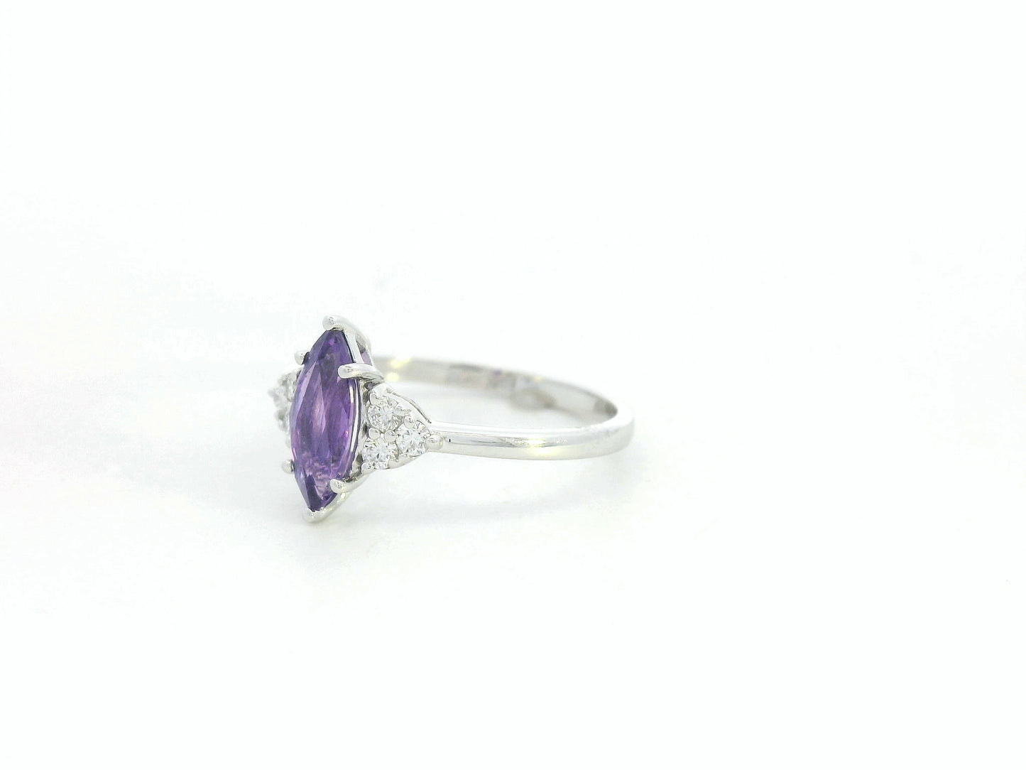 Purple sapphire and diamond ring marquise cut 0.99 carat in 18K white gold by Emirates Diamonds