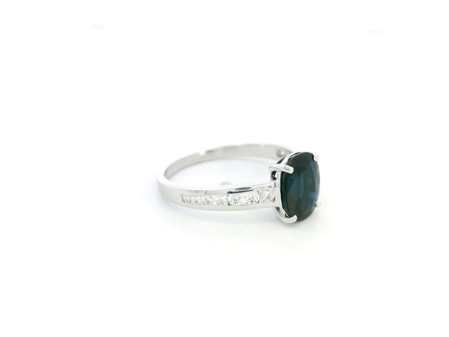 Oval blue sapphire ring 2.33 carat with diamond accents in 18K white gold by Emirates Diamonds