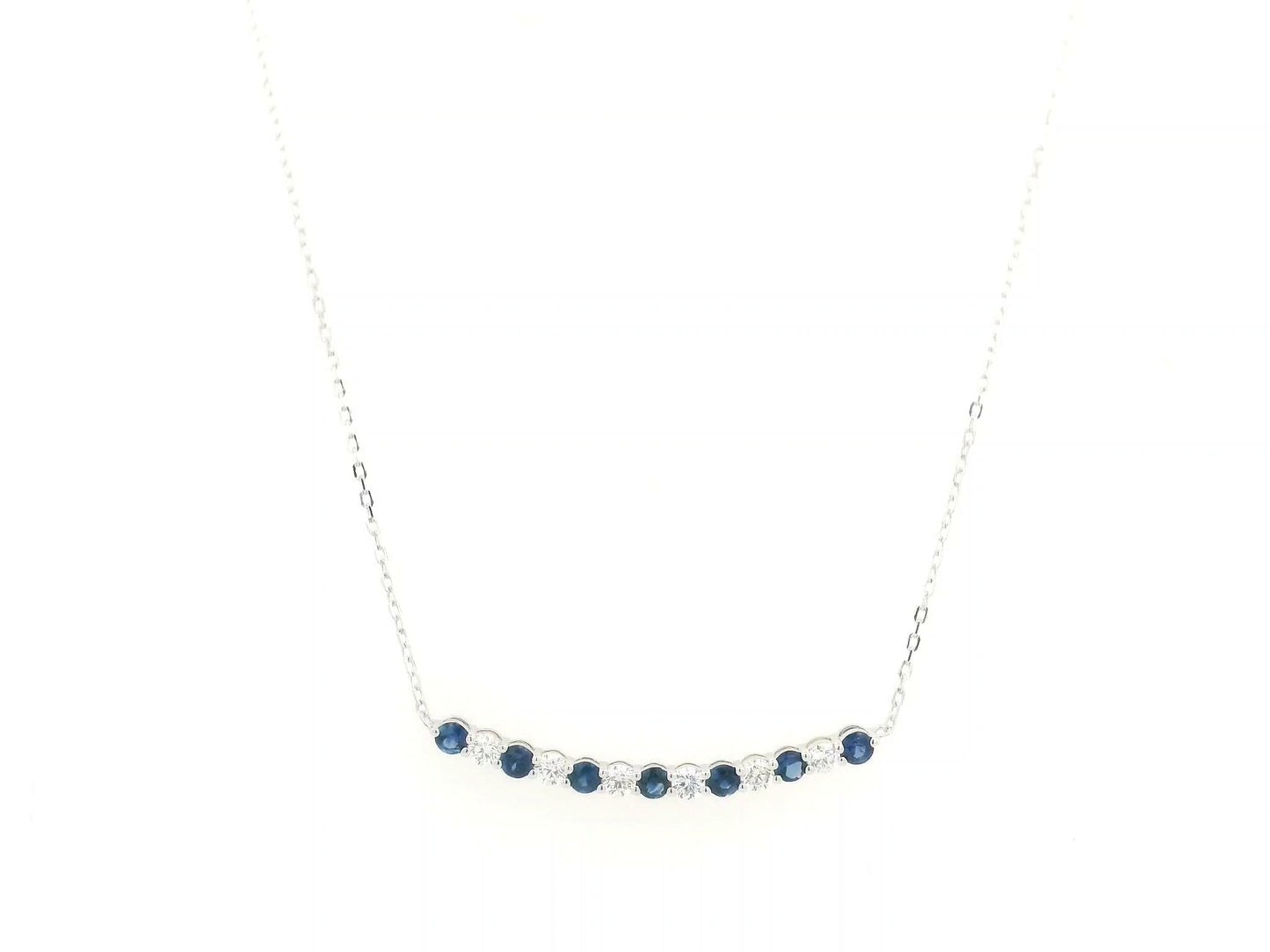 Blue sapphire and diamond bar necklace in 18K white gold featuring 0.74 carats of sapphires and 0.55 carats of diamonds by Emirates Diamonds.