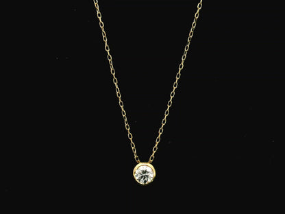 18K yellow gold diamond solitaire necklace featuring a 0.43 carat natural diamond in a modern bezel setting.