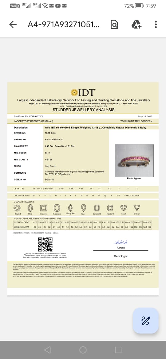 18k Gold Ruby and Diamond Bangle.