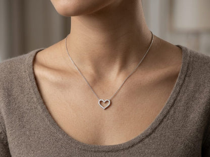 18K white gold open heart diamond necklace featuring 0.20 carat natural diamonds in a delicate pavé setting.