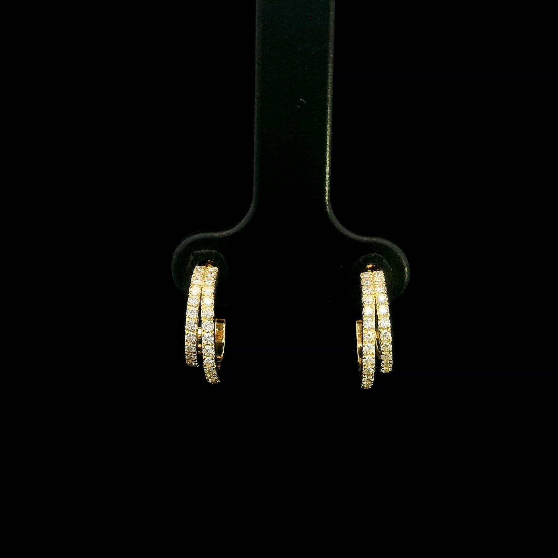 Double row diamond earrings in 18K yellow gold with curved parallel rows of round diamonds