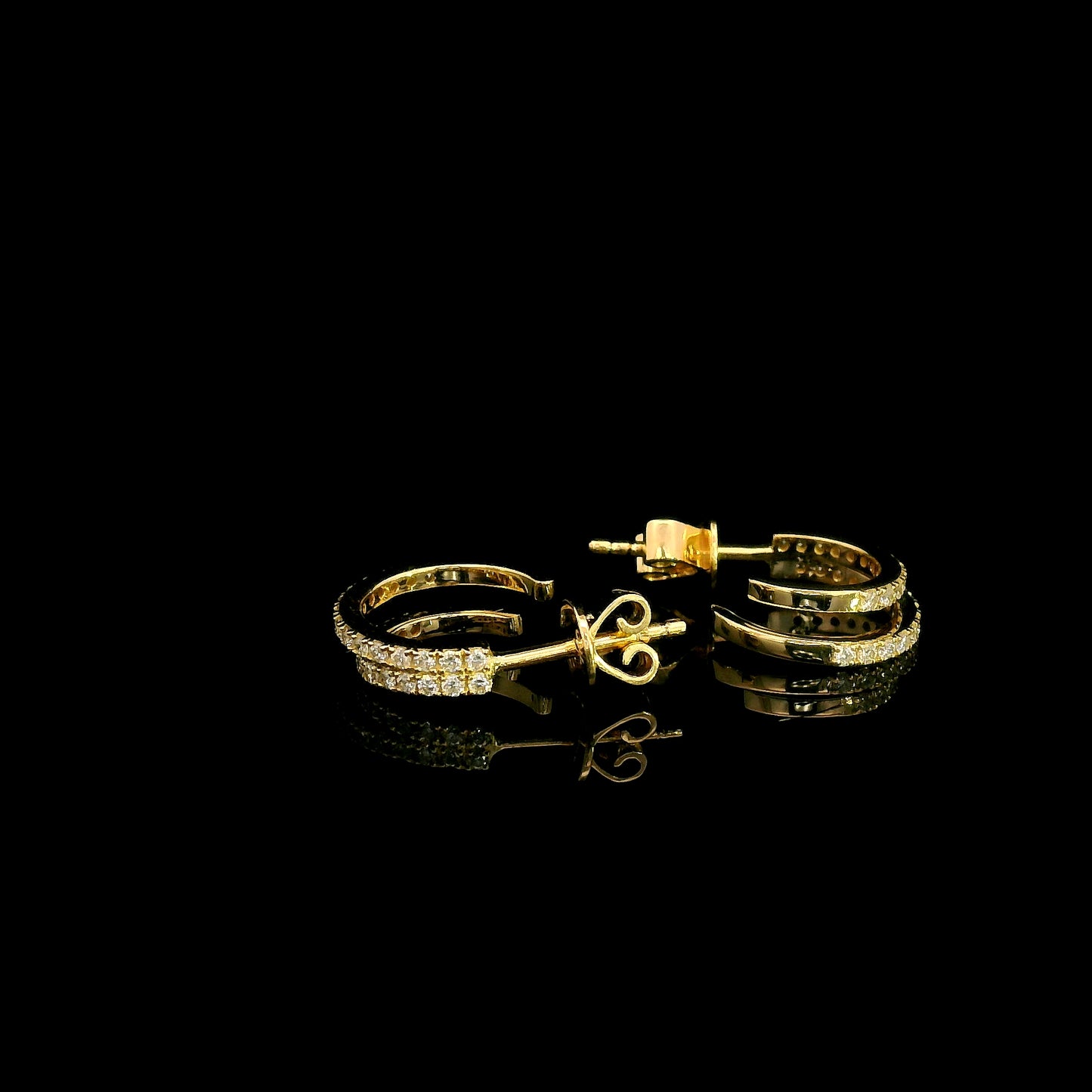 Double row diamond earrings in 18K yellow gold with curved parallel rows of round diamonds
